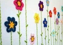 unos cuadros a crochet con flores de todo tipo y estilo
